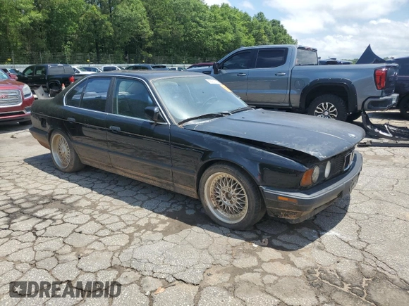 1989 BMW 5 Series with VIN WBAHD1314KBF08237, listed as a Copart auction lot 58951325 with 255,984 mi miles and Clean title. Bid and sale history available at DreamBid. Image 4.