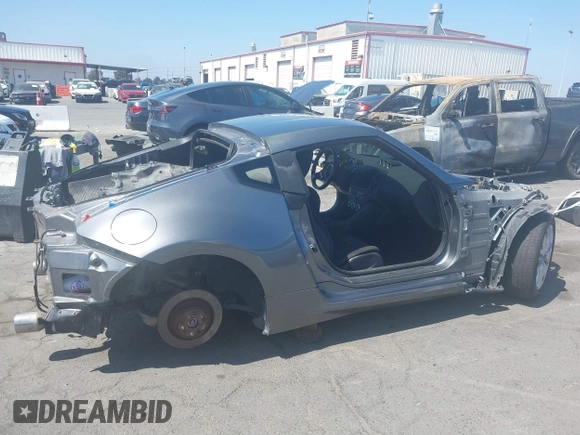 2014 Nissan 370Z Nismo with VIN JN1AZ4EH9EM632501, listed as a IAAI auction lot 39504585 with Not Provided miles and . Bid and sale history available at DreamBid. Image 13.