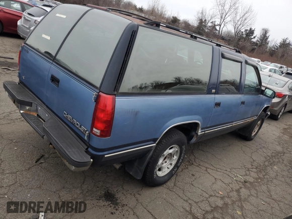 1994 Chevrolet Suburban z VIN 1GNFK16K4RJ348093, wystawiony jako Copart lot #87352784 z przebiegiem 118 442 mil mil oraz Nie do naprawy • Non repairable. Historia ofert i sprzedaży dostępna na DreamBid. Obrazek 3.