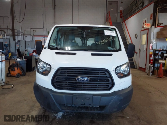 2015 Ford Transit Cargo with VIN 1FTNE1ZM8FKB17731, listed as a IAAI auction lot 42351353 with 74,489 mi miles and . Bid and sale history available at DreamBid. Image 12.