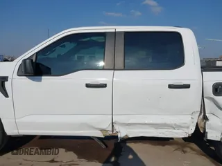 2023 Ford F-150 XL z VIN 1FTEW1CPXPKF87647, wystawiony jako IAAI lot #41486870 z przebiegiem 23 609 mil mil oraz . Historia ofert i sprzedaży dostępna na DreamBid. Obrazek 14.