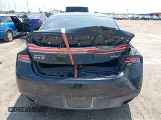 2013 Lincoln MKZ z VIN 3LN6L2G95DR822487, wystawiony jako IAAI lot #42347635 z przebiegiem 81 596 mil mil oraz . Historia ofert i sprzedaży dostępna na DreamBid. Obrazek 6.