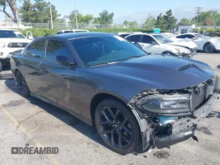 2019 Dodge Charger R/T z VIN 2C3CDXCT7KH527732, wystawiony jako IAAI lot #42283453 z przebiegiem 99 755 mil mil oraz . Historia ofert i sprzedaży dostępna na DreamBid. Obrazek 1.