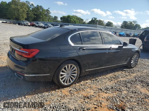 2017 BMW 7 Series 740i with VIN WBA7E2C57HG739482, listed as a Copart auction lot 53652145 with 102,418 mi miles and Salvage title. Bid and sale history available at DreamBid. Image 3.