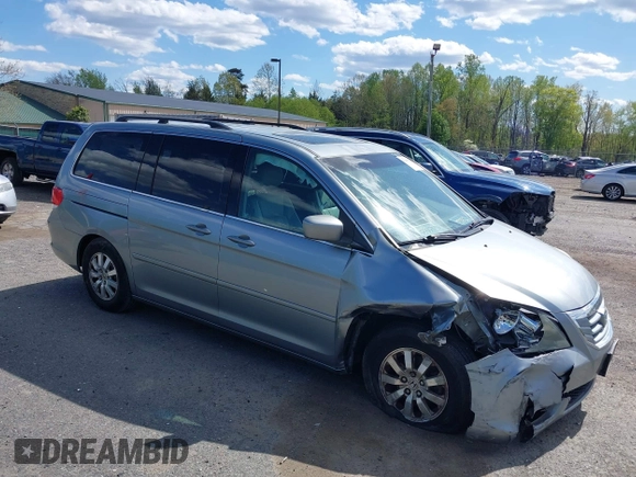 2010 Honda Odyssey EX-L with VIN 5FNRL3H74AB046578, listed as a IAAI auction lot 42049213 with 218,457 mi miles. Bid and sale history available at carsss.com. Image 1.