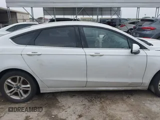 2018 Ford Fusion SE z VIN 3FA6P0HD1JR191576, wystawiony jako IAAI lot #42282669 z przebiegiem 73 439 mil mil oraz . Historia ofert i sprzedaży dostępna na DreamBid. Obrazek 13.