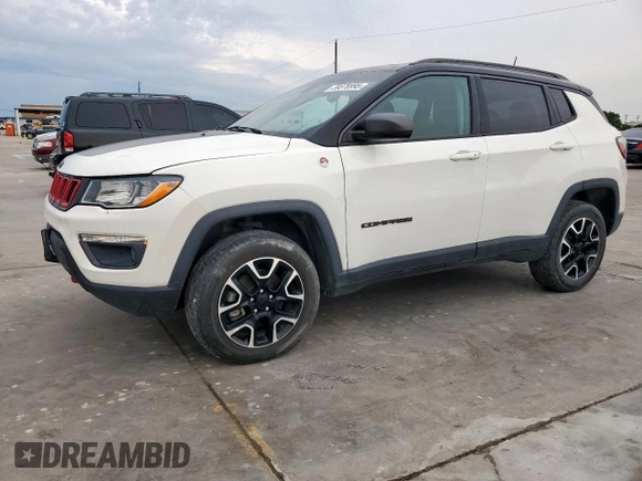 2020 Jeep Compass Trailhawk with VIN 3C4NJDDB3LT189398, listed as a Copart auction lot 59376995 with 75,674 mi miles and Salvage title. Bid and sale history available at DreamBid. Image 1.