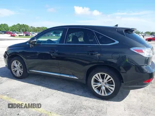 2010 Lexus RX 450h with VIN JTJZB1BAXA2002631, listed as a IAAI auction lot 42744998 with 118,851 mi miles and . Bid and sale history available at DreamBid. Image 14.