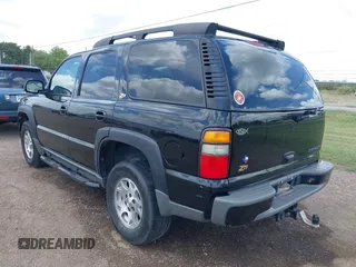 2004 Chevrolet Tahoe Z71 with VIN 1GNEK13ZX4R184775, listed as a IAAI auction lot 42433671 with 77,019 mi miles and . Bid and sale history available at DreamBid. Image 3.