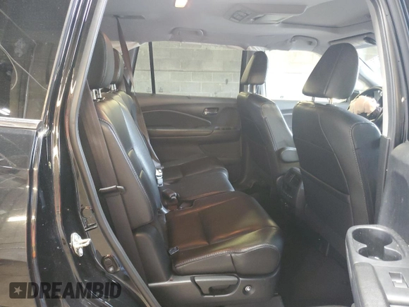 2017 Honda Pilot Touring z VIN 5FNYF6H91HB011030, wystawiony jako Copart lot #60236875 z przebiegiem 119 909 mil mil oraz Szkoda całkowita • Salvage title. Historia ofert i sprzedaży dostępna na DreamBid. Obrazek 11.