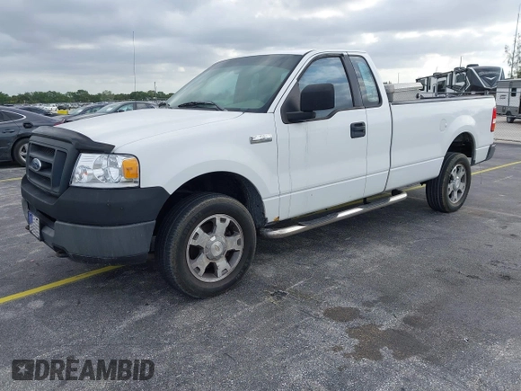 2005 Ford F-150 XL with VIN 1FTRF14W35NB42167, listed as a IAAI auction lot 41990938 with 256,964 mi miles. Bid and sale history available at carsss.com. Image 2.