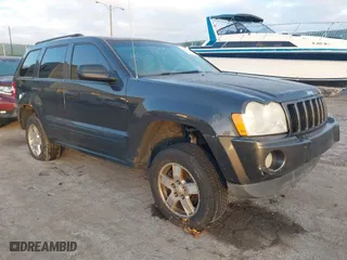 2006 Jeep Grand Cherokee Laredo with VIN 1J4GR48K06C163251, listed as a IAAI auction lot 41103169 with 186,346 mi miles. Bid and sale history available at carsss.com. Image 1.