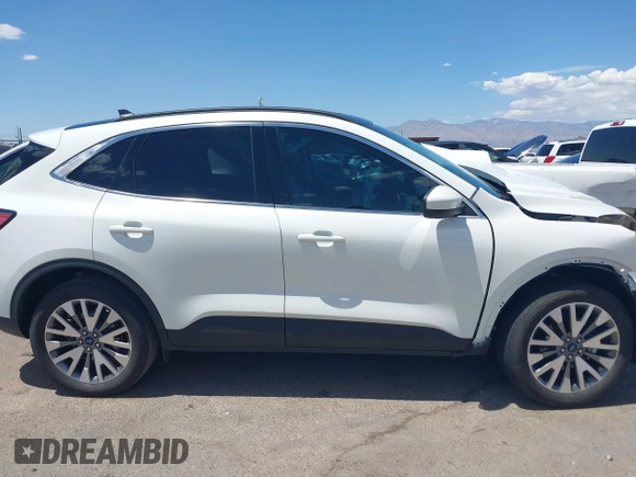 2022 Ford Escape Titanium z VIN 1FMCU9J97NUB89504, wystawiony jako IAAI lot #42571833 z przebiegiem Nie podano mil oraz . Historia ofert i sprzedaży dostępna na DreamBid. Obrazek 13.