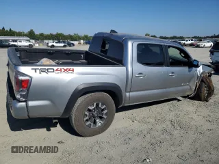 2023 Toyota Tacoma SR with VIN 3TMCZ5AN3PM645372, listed as a Copart auction lot 59917365 with 27,146 mi miles and Salvage title. Bid and sale history available at DreamBid. Image 3.