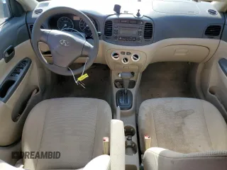 2006 Hyundai Accent GLS z VIN KMHCN46C56U050963, wystawiony jako Copart lot #60979955 z przebiegiem Nie podano mil oraz Czysty tytuł • Clean title. Historia ofert i sprzedaży dostępna na DreamBid. Obrazek 8.