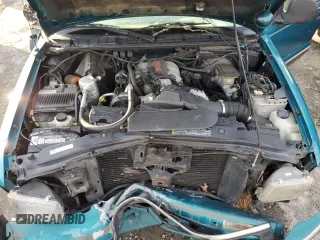 1995 Chevrolet Blazer z VIN 1GNDT13W2SK204831, wystawiony jako Copart lot #86301424 z przebiegiem 122 281 mil mil oraz Szkoda całkowita • Salvage title. Historia ofert i sprzedaży dostępna na DreamBid. Obrazek 12.