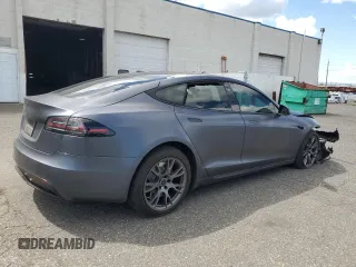 2022 Tesla Model S с VIN 5YJSA1E5XNF488415, выставлен на аукционе Copart как лот 57347565 с пробегом 18 662 миль миль и Списание • Salvage title. История ставок и продаж доступна на DreamBid. Изображение 3.