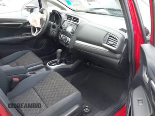 2016 Honda Fit LX with VIN JHMGK5H59GS008911, listed as a IAAI auction lot 42002981 with 96,224 mi miles and . Bid and sale history available at DreamBid. Image 5.