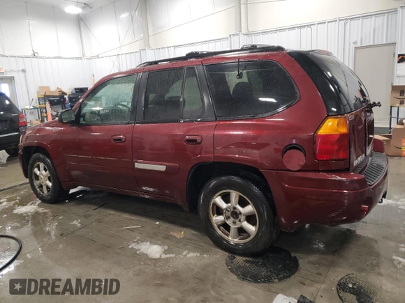 2003 GMC Envoy SLT with VIN 1GKDT13S532241707, listed as a Copart auction lot 86694024 with 185,480 mi miles and Clean Title. Bid and sale history available at carsss.com. Image 2.