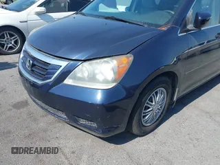 2008 Honda Odyssey LX with VIN 5FNRL38268B025424, listed as a IAAI auction lot 42432326 with 210,644 mi miles and . Bid and sale history available at DreamBid. Image 6.