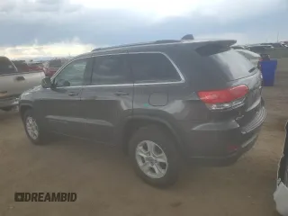 2017 Jeep Grand Cherokee Laredo with VIN 1C4RJFAG9HC653648, listed as a Copart auction lot 63049635 with 72,428 mi miles and Salvage title. Bid and sale history available at DreamBid. Image 2.