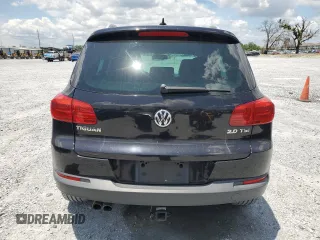 2014 Volkswagen Tiguan SE z VIN WVGAV3AX8EW613762, wystawiony jako Copart lot #61385765 z przebiegiem 167 278 mil mil oraz Czysty tytuł • Clean title. Historia ofert i sprzedaży dostępna na DreamBid. Obrazek 6.