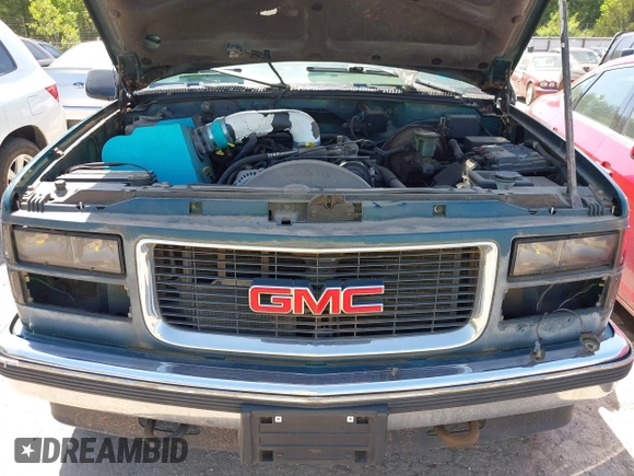 1996 GMC Sierra 1500 z VIN 1GTEK19R6TE514322, wystawiony jako IAAI lot #42253821 z przebiegiem 190 491 mil mil oraz . Historia ofert i sprzedaży dostępna na DreamBid. Obrazek 10.