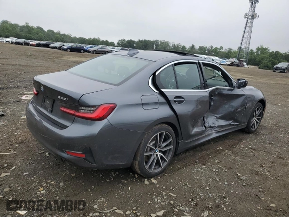 2020 BMW 3 Series 330i xDrive with VIN 3MW5R7J09L8B13892, listed as a Copart auction lot 60714015 with 49,766 mi miles and Salvage title. Bid and sale history available at DreamBid. Image 3.