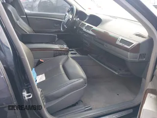 2006 BMW 7 Series 750Li with VIN WBAHN83576DT26418, listed as a IAAI auction lot 41555297 with 124,801 mi miles. Bid and sale history available at carsss.com. Image 5.