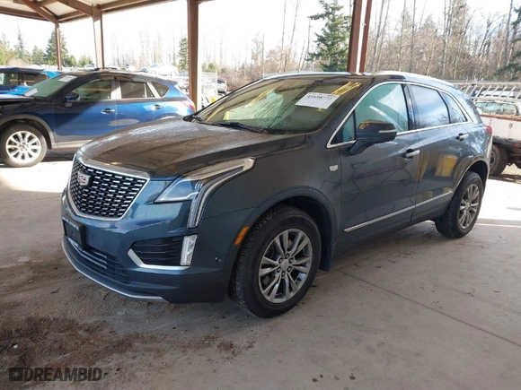 2021 Cadillac XT5 AWD Premium Luxury with VIN 1GYKNDRS3MZ139802, listed as a IAAI auction lot 41698772 with 62,886 mi miles. Bid and sale history available at carsss.com. Image 2.