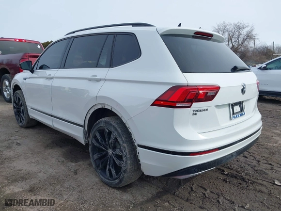 2020 Volkswagen Tiguan SE with VIN 3VV2B7AX4LM106638, listed as a IAAI auction lot 41744503 with 67,693 mi miles. Bid and sale history available at carsss.com. Image 3.