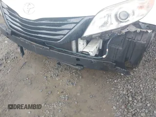 2014 Toyota Sienna L with VIN 5TDZK3DC9ES473780, listed as a IAAI auction lot 42245274 with 203,060 mi miles and . Bid and sale history available at DreamBid. Image 6.