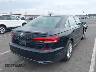 2020 Volkswagen Passat 2.0T SE with VIN 1VWSA7A32LC008611, listed as a IAAI auction lot 41912651 with 104,014 mi miles. Bid and sale history available at carsss.com. Image 4.
