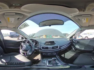 2014 Mazda 3 i Touring z VIN JM1BM1V75E1156514, wystawiony jako Copart lot #54227795 z przebiegiem 139 411 mil mil oraz Szkoda całkowita • Salvage title. Historia ofert i sprzedaży dostępna na DreamBid. Obrazek 14.