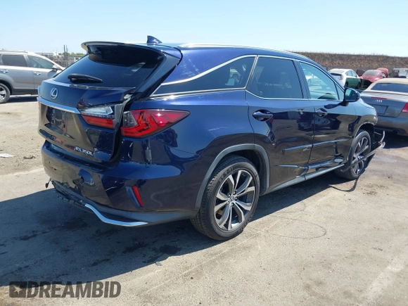 2018 Lexus RX 350L Premium with VIN JTJDZKCA4J2009035, listed as a IAAI auction lot 42636998 with 108,555 mi miles and . Bid and sale history available at DreamBid. Image 4.