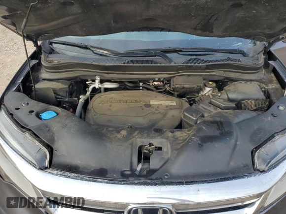 2020 Honda Pilot Touring 8-Passenger with VIN 5FNYF5H91LB004386, listed as a Copart auction lot 85913984 with 54,692 mi miles and Salvage Title. Bid and sale history available at DreamBid. Image 14.