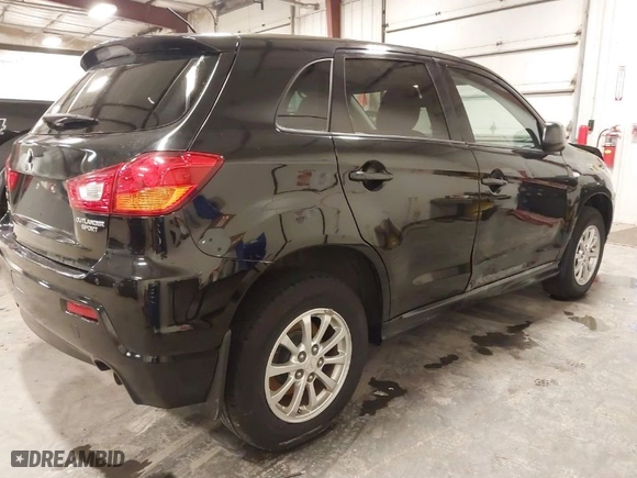 2011 Mitsubishi Outlander Sport ES with VIN JA4AP3AU8BZ002333, listed as a IAAI auction lot 41823067 with 121,794 mi miles. Bid and sale history available at carsss.com. Image 4.
