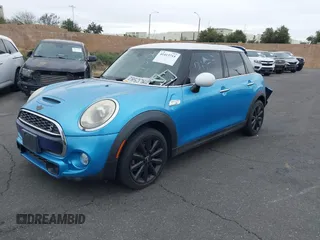 2015 MINI Hardtop 4 Door S with VIN WMWXU3C58F2B58305, listed as a IAAI auction lot 41413715 with 98,413 mi miles and . Bid and sale history available at DreamBid. Image 2.