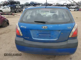 2009 Kia Rio LX with VIN KNADE243296494243, listed as a IAAI auction lot 41307888 with 133,487 mi miles. Bid and sale history available at carsss.com. Image 16.