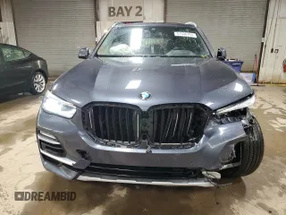 2021 BMW X5 xDrive40i with VIN 5UXCR6C00M9G00599, listed as a Copart auction lot 51536795 with 55,422 mi miles and Salvage title. Bid and sale history available at DreamBid. Image 5.