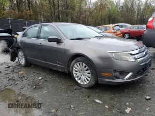 2010 Ford Fusion Hybrid with VIN 3FADP0L3XAR254079, listed as a Copart auction lot 52196855 with 118,015 mi miles and Salvage Title. Bid and sale history available at carsss.com. Image 4.