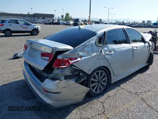 2019 Kia Optima LX z VIN 5XXGT4L38KG354885, wystawiony jako IAAI lot #42394182 z przebiegiem Nie podano mil oraz . Historia ofert i sprzedaży dostępna na DreamBid. Obrazek 11.
