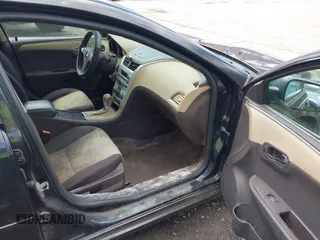 2011 Chevrolet Malibu 1LS with VIN 1G1ZB5E10BF293570, listed as a IAAI auction lot 42058205 with 92,316 mi miles and . Bid and sale history available at DreamBid. Image 5.