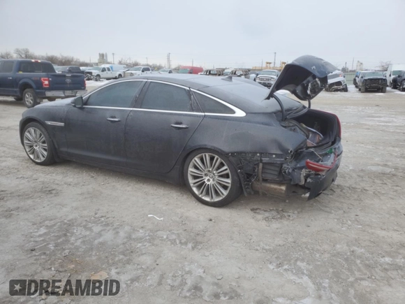 2013 Jaguar XJ with VIN SAJWA1C70D8V41578, listed as a Copart auction lot 89080585 with 76,063 mi miles and Salvage Title. Bid and sale history available at DreamBid. Image 2.