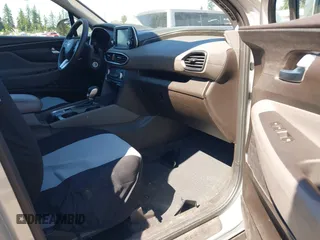 2019 Hyundai Santa Fe SE with VIN 5NMS2CAD9KH122140, listed as a IAAI auction lot 42616171 with 50,794 mi miles and . Bid and sale history available at DreamBid. Image 5.