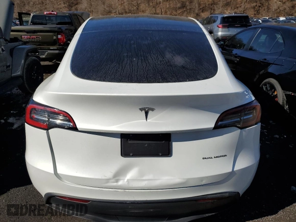 2023 Tesla Model Y Long Range z VIN 7SAYGDEE5PF785124, wystawiony jako Copart lot #56553785 z przebiegiem 31 341 mil mil oraz Szkoda całkowita • Salvage title. Historia ofert i sprzedaży dostępna na DreamBid. Obrazek 6.
