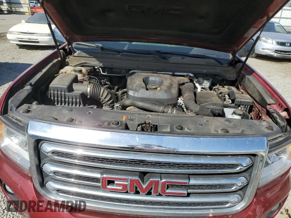 2018 GMC Canyon 4WD SLT with VIN 1GTP6DE16J1136652, listed as a Copart auction lot 45776315 with 138,469 mi miles and Salvage Title. Bid and sale history available at DreamBid. Image 11.