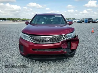 2014 Kia Sorento LX z VIN 5XYKT3A67EG461489, wystawiony jako Copart lot #57498295 z przebiegiem 198 799 mil mil oraz Szkoda całkowita • Salvage title. Historia ofert i sprzedaży dostępna na DreamBid. Obrazek 13.