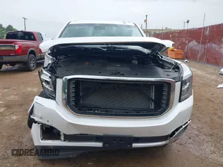 2016 GMC Yukon Denali with VIN 1GKS1CKJ7GR237852, listed as a IAAI auction lot 41944398 with 65,703 mi miles. Bid and sale history available at carsss.com. Image 13.