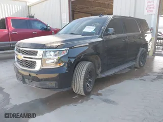 2018 Chevrolet Tahoe Commercial with VIN 1GNSKDEC8JR351269, listed as a IAAI auction lot 41602443 with 79,970 mi miles. Bid and sale history available at carsss.com. Image 2.